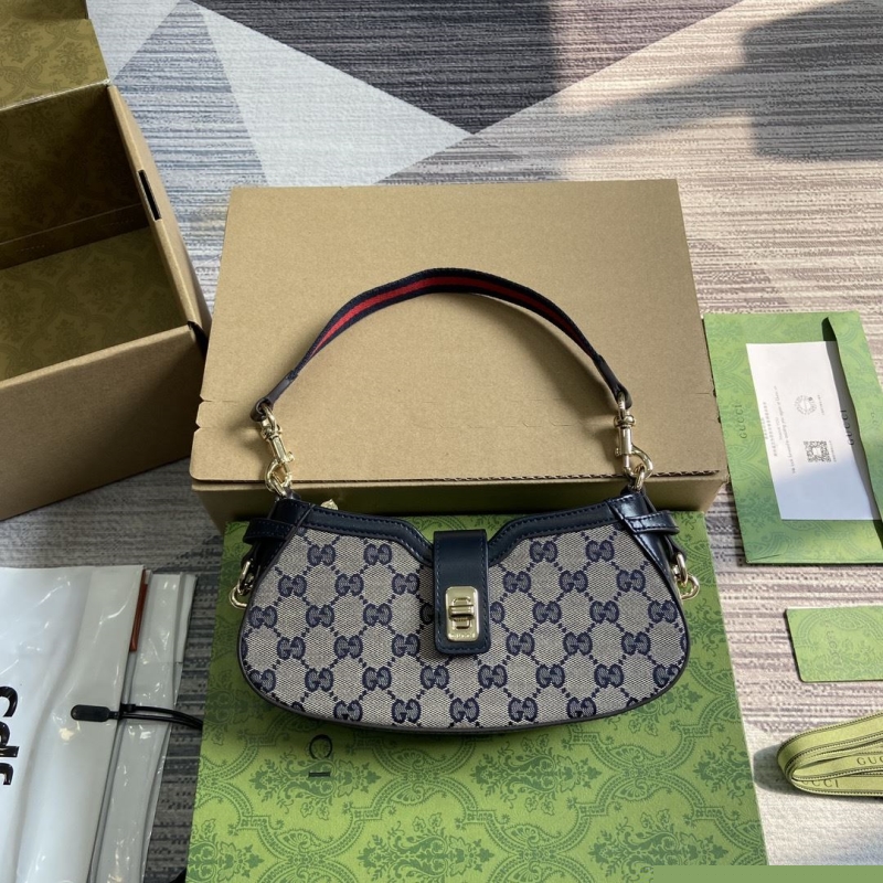 G*u*i top handle bags